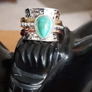 NWOT  Wide band worry silver alloy ring with faux green stone
